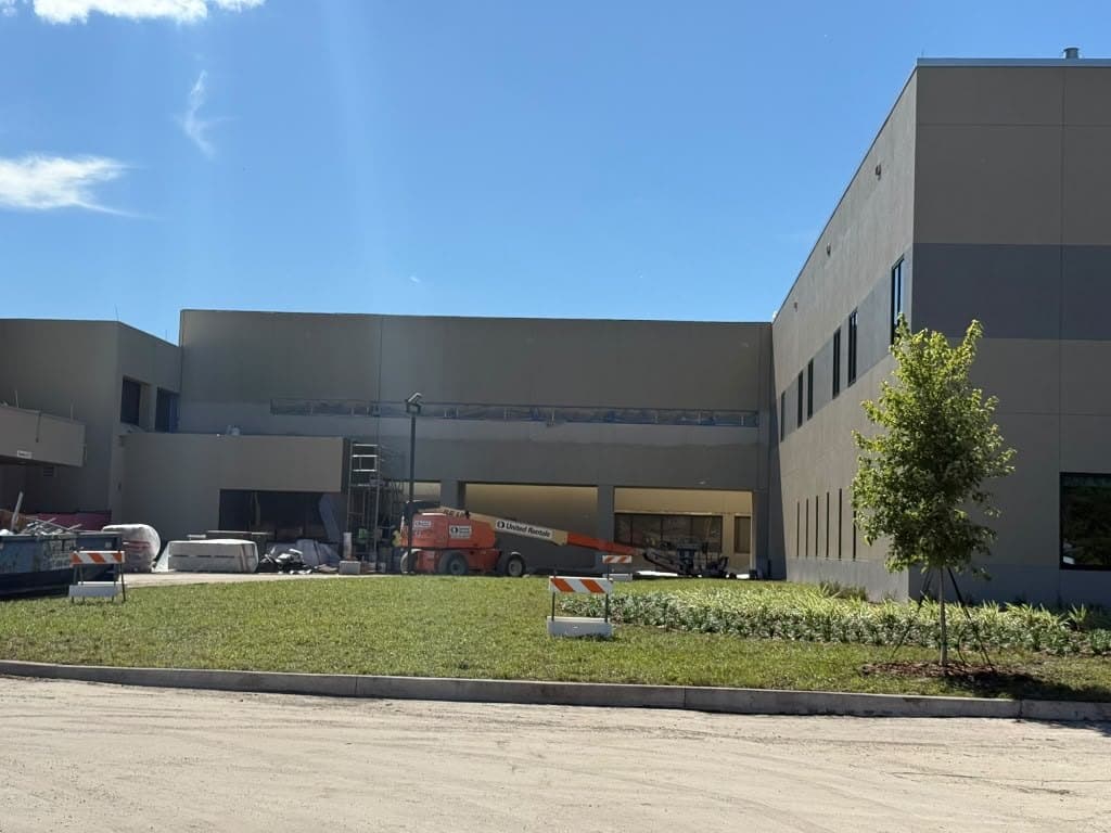 Large commercial building exterior painting - Central Florida