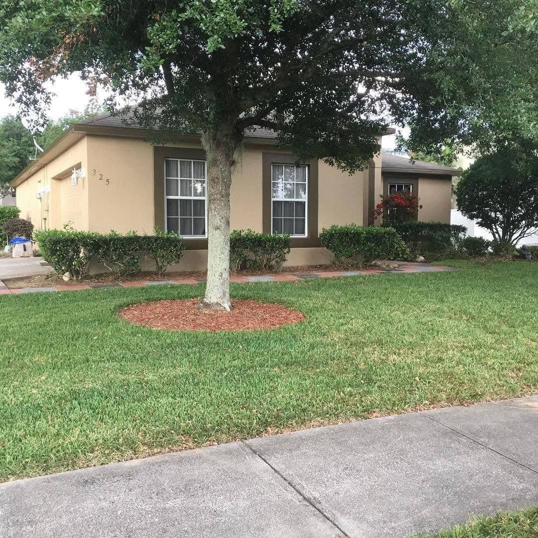 Beige exterior home painting - front view