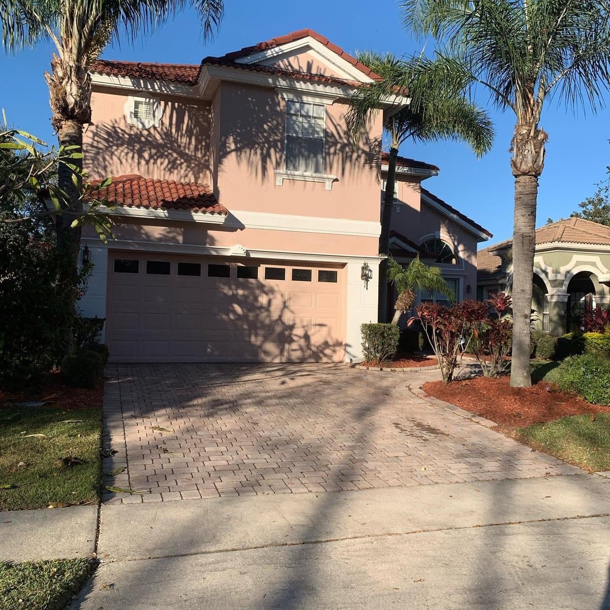 Stucco home exterior painting - front view