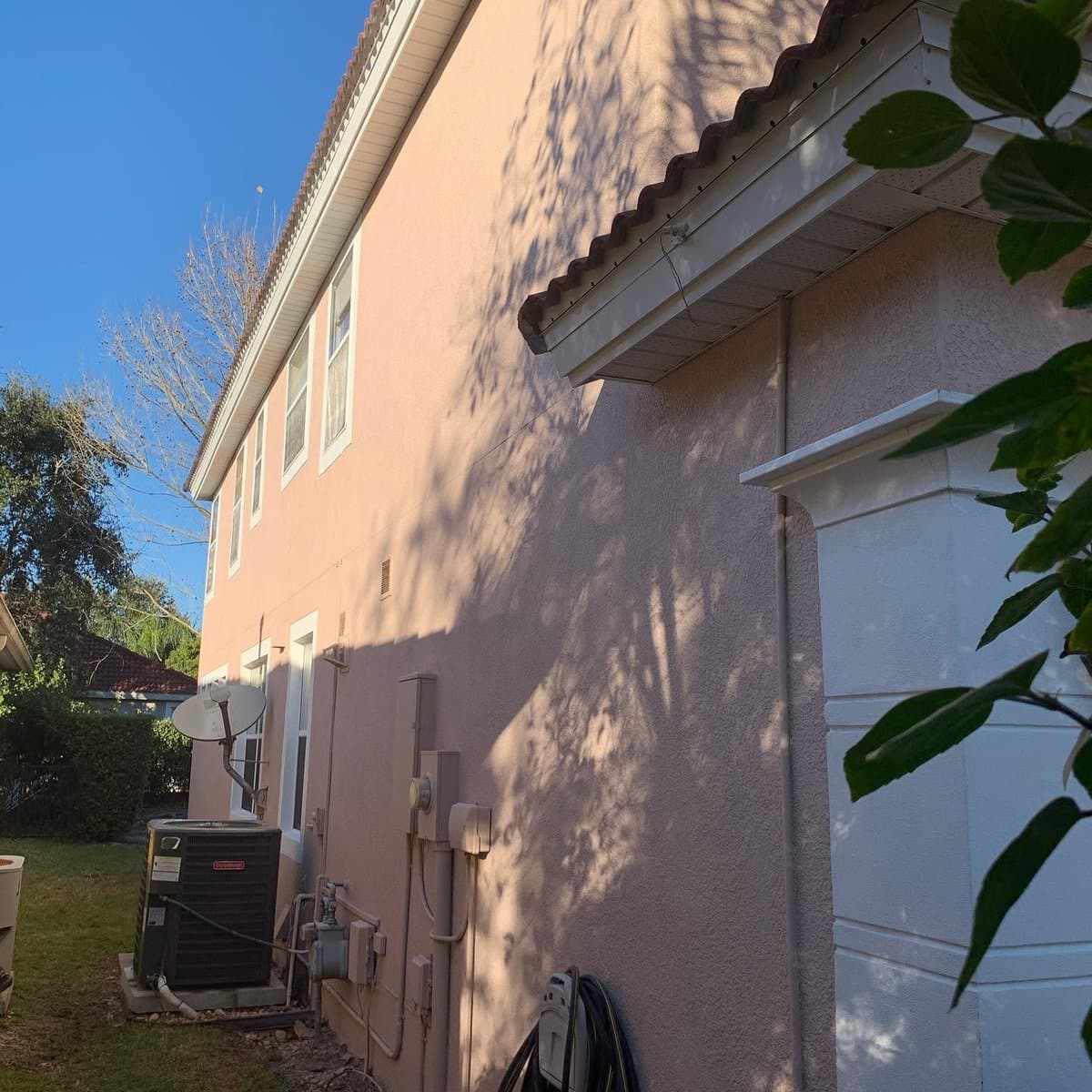 Stucco home exterior painting - side detail